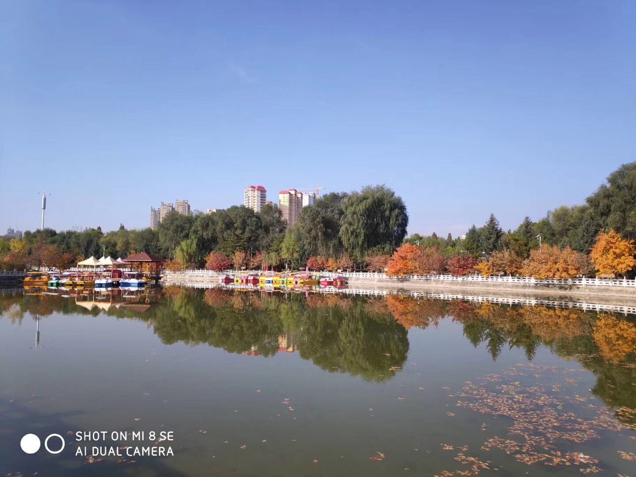 SCENIC VIEW OF LAKE AGAINST BUILDINGS