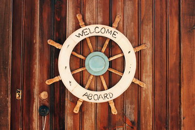 Close-up of clock on wood