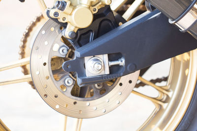 Close-up of cropped motorcycle wheel