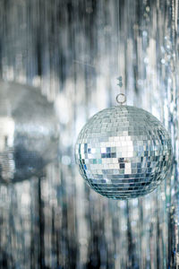 Close-up of crystal ball hanging from ceiling