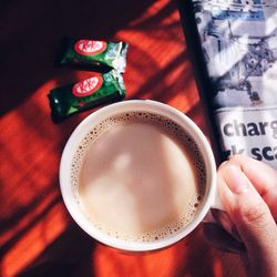 High angle view of coffee cup on table