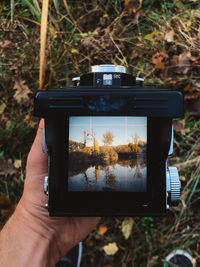 Man photographing with mobile phone