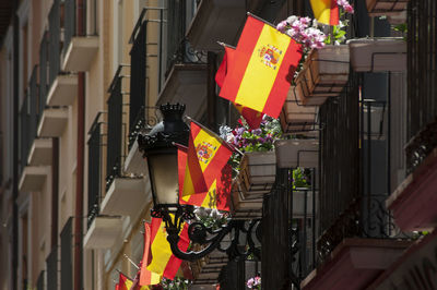 Multi colored flags in city