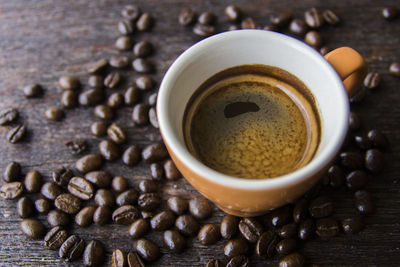 High angle view of coffee cup on table