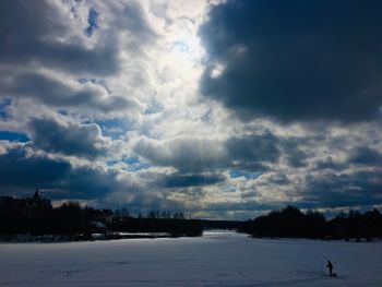 Scenic view of snow field against sky