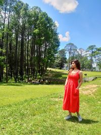 Woman standing on field