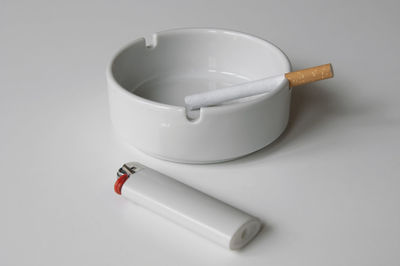 High angle view of pen on table against white background