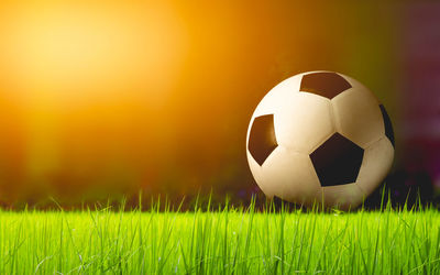 Close-up of soccer ball on field