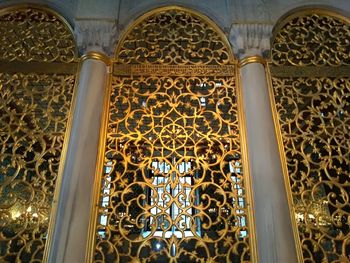 Low angle view of ornate window in building