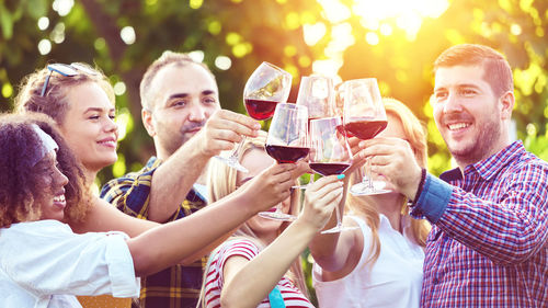 Group of friends drinking glass