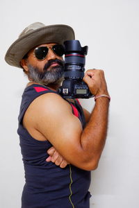 Portrait of man photographing