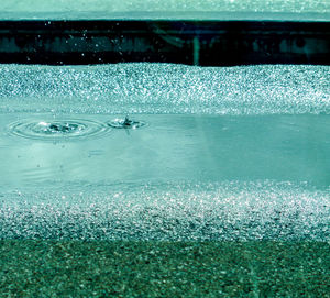 Water drops on swimming pool