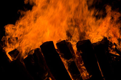 Low angle view of bonfire on fire at night