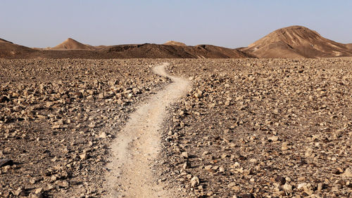 Scenic view of minor road in the desert 