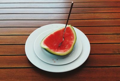 High angle view of fruits in plate on table