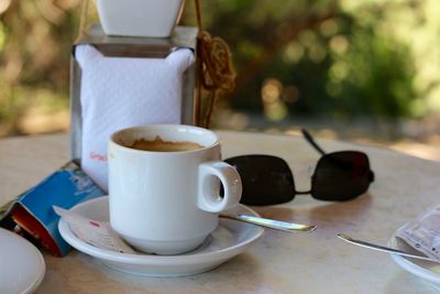 Close-up of fresh coffee on table at cafe