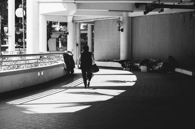 Full length of woman standing in city