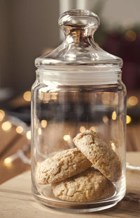 Close-up of ice cream in glass jar on table