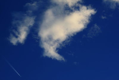 Low angle view of vapor trail in sky
