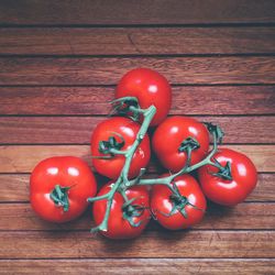 Close-up of tomatoes on wooden table