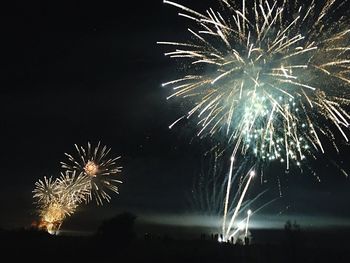 Firework display at night