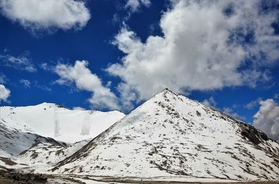 Scenic view of snow covered mountains