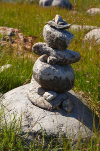 Stack of stones on field