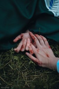 High angle view of people holding hands