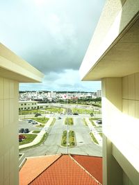 View of buildings against cloudy sky