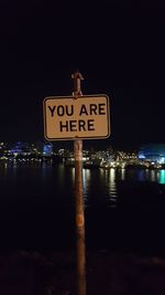 Information sign at night