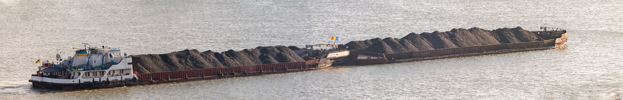 High angle view of container ship in sea