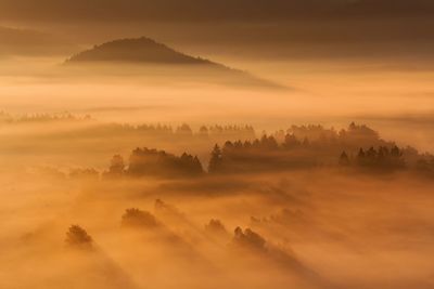 Scenic view of mountains against sky during sunset