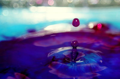 Macro shot of water falling from water