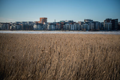 Panoramic shot of cityscape against clear sky