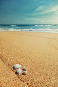 Scenic view of beach against sky