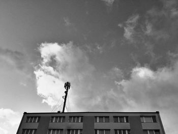 High section of building against cloudy sky