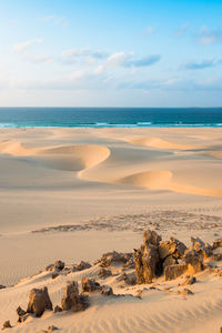 Scenic view of beach against sky