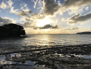 Scenic view of sea against sky during sunset