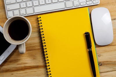 High angle view of coffee cup on table