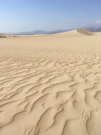 Scenic view of desert against clear sky