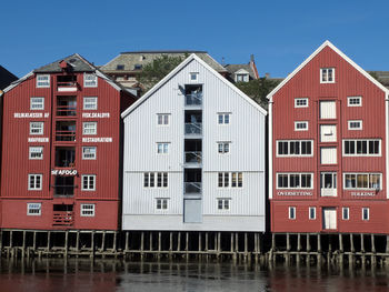 Residential buildings against blue sky