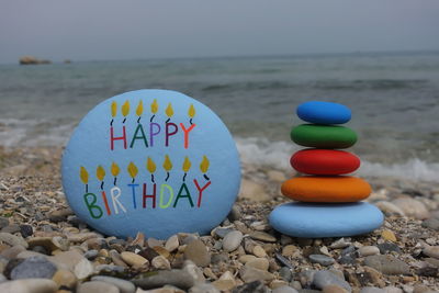 Close-up of multi colored stones on beach