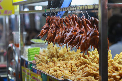 Crispy fried butter quail in ho thi ky street food, ho chi minh city