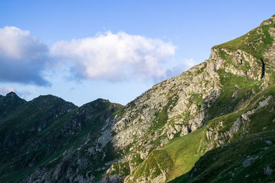 Scenic view of rocky mountains against sky, fagaras mountains, romania