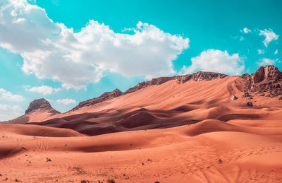 Scenic view of desert against sky