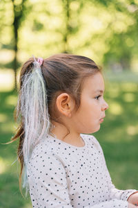 Side view of girl looking away