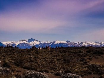 Panoramic view of snowcapped mountains against sky
