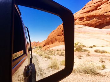 Scenic view of desert against clear sky