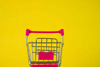 Close-up of yellow pink umbrella