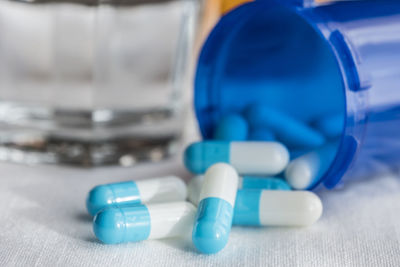 Close-up of blue bottles on table